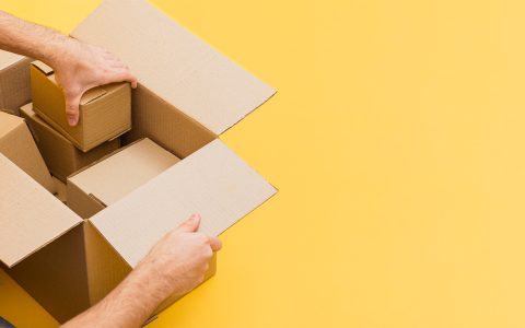 high-angle-man-arranging-delivery-packages 2